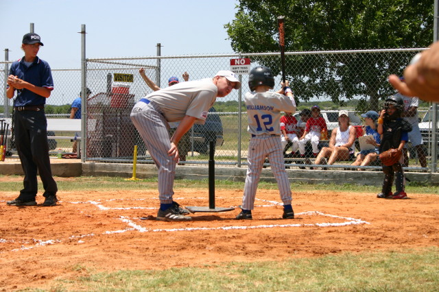 2006/06(June)/2006-06-17-Tball-practice-tournament/640x480_2006-06-17-Tball-AllStars-Bulldogs-Hays-CO-059-Brad-talks-to-Logan-at-bat.JPG