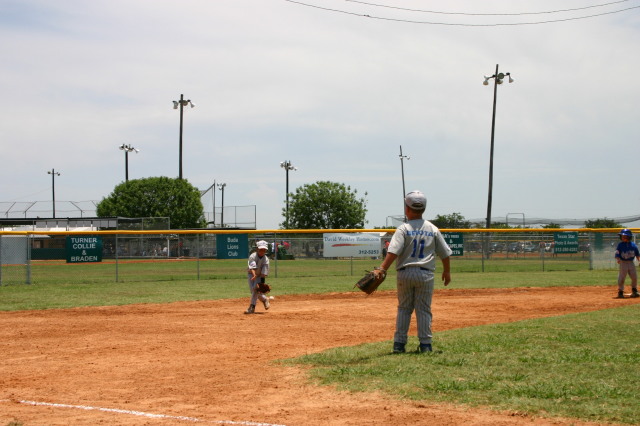 2006-06-17-Tball-AllStars-Bulldogs-Hays-CO-107-Seth-fields-the-ball.JPG