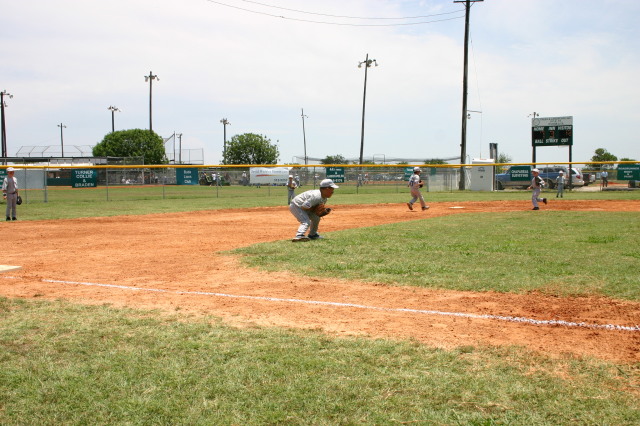 2006-06-17-Tball-AllStars-Bulldogs-Hays-CO-113-Seth-runs-to-2nd.JPG