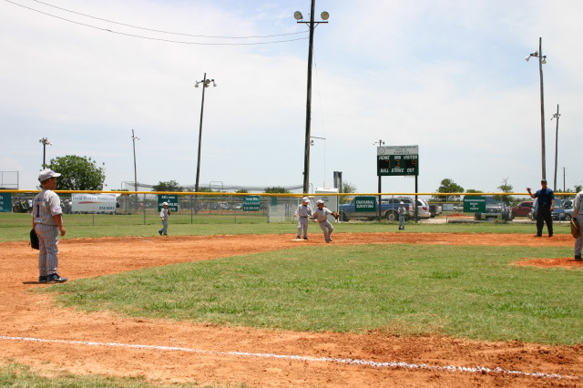 2006-06-17-Tball-AllStars-Bulldogs-Hays-CO-114-Seth-ran-to-2nd.JPG