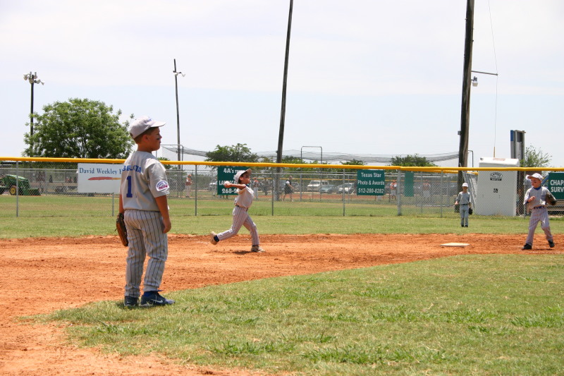 2006-06-17-Tball-AllStars-Bulldogs-Hays-CO-006-Seth-throwing.JPG