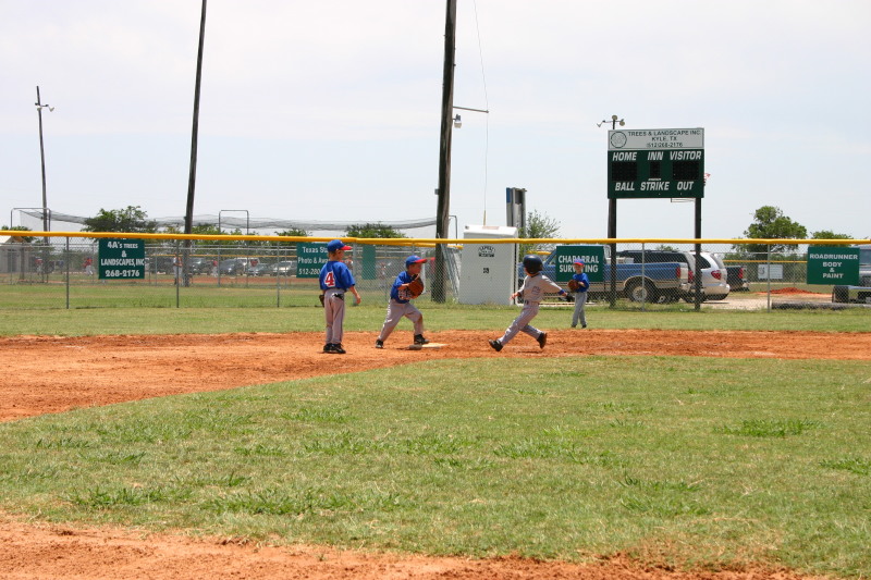 2006-06-17-Tball-AllStars-Bulldogs-Hays-CO-029-Joseph-out-at-2nd.JPG