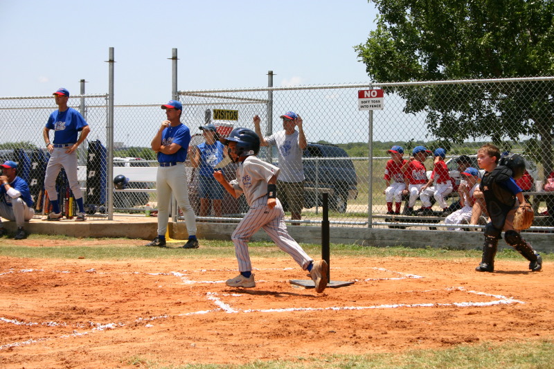 2006-06-17-Tball-AllStars-Bulldogs-Hays-CO-090-Seth-runs-but-where-is-the-BAT.JPG