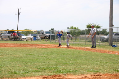 2006-06-17-Tball-AllStars-Bulldogs-Hays-CO-026-Joseph-safe-at-1st.JPG