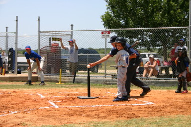 2006-06-17-Tball-AllStars-Bulldogs-Hays-CO-037-Chance-looking-at-coach.JPG