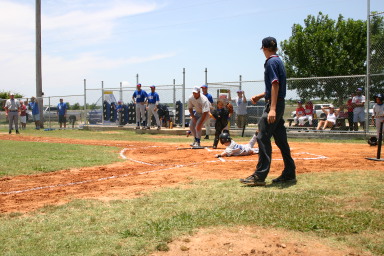 2006-06-17-Tball-AllStars-Bulldogs-Hays-CO-045-Ryan-slides-home.JPG