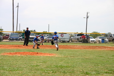 2006-06-17-Tball-AllStars-Bulldogs-Hays-CO-048-Gages-hit.JPG