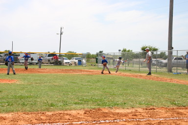 2006-06-17-Tball-AllStars-Bulldogs-Hays-CO-088-Joseph-runs-through-first-GOOD.JPG