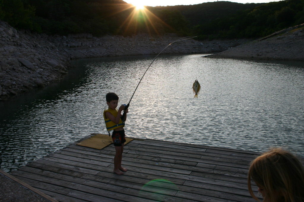 2006-07-22-Justin-sailboat-25-fishing-Dax.JPG