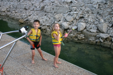 2006-07-22-Justin-sailboat-22-fishing-Dax-Kyla.JPG