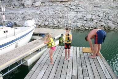 2006-07-22-Justin-sailboat-29-fishing-Kyla-Dax.JPG