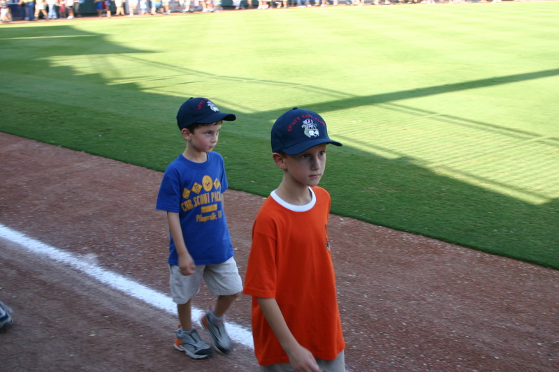 2006-08-02-Scout-campout-Dell-Diamond-12-parade-Chance-Dax.JPG