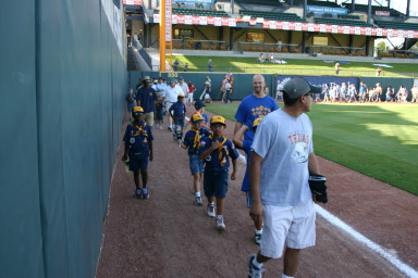 2006-08-02-Scout-campout-Dell-Diamond-10-parade-Chance-Dax.JPG