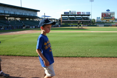 2006-08-02-Scout-campout-Dell-Diamond-16-parade-Dax.JPG