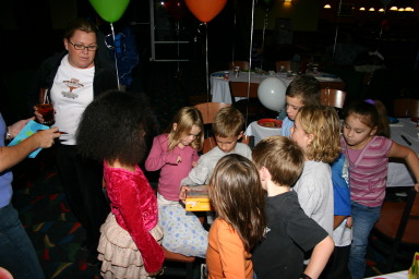 2006-10-26-Chance-7th-bday-party-bowling-12-presents.JPG