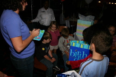 2006-10-26-Chance-7th-bday-party-bowling-14-presents.JPG
