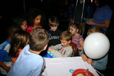 2006-10-26-Chance-7th-bday-party-bowling-15-presents.JPG