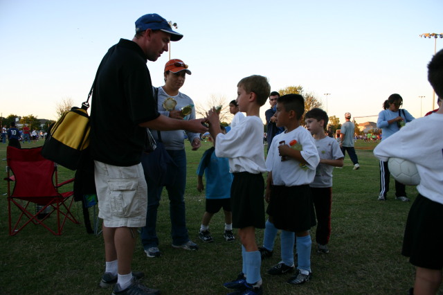 2006-10-28-Chance-Soccer-3v3-tourney-81-CoachMark-trophy-for-Chance.JPG