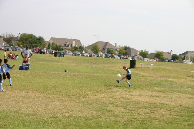 2006-10-TigerSharks-Soccer-26-Chance-high-kick.JPG