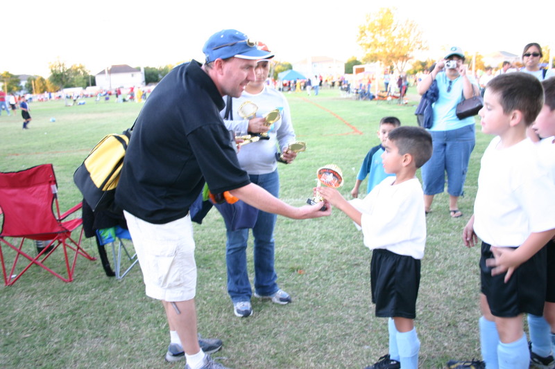 2006-10-28-Chance-Soccer-3v3-tourney-78-CoachMark-trophy-for-Jonathon.JPG