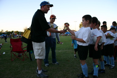 2006-10-28-Chance-Soccer-3v3-tourney-79-CoachMark-trophy-for-Brandon.JPG