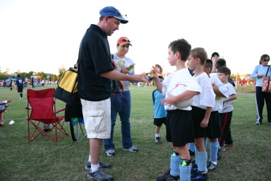 2006-10-28-Chance-Soccer-3v3-tourney-80-CoachMark-trophy-for-Matthew.JPG