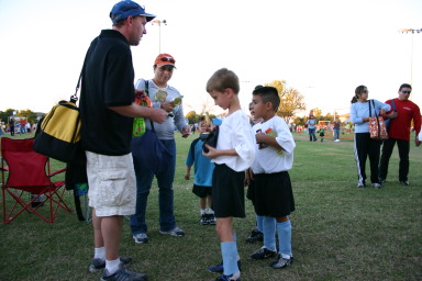 2006-10-28-Chance-Soccer-3v3-tourney-82-CoachMark-trophy-for-Chance.JPG