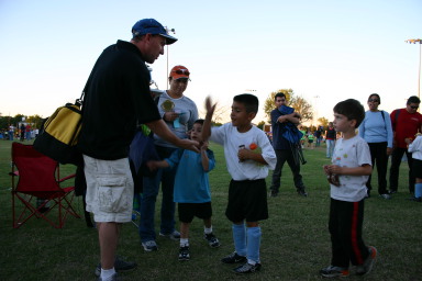 2006-10-28-Chance-Soccer-3v3-tourney-84-CoachMark-trophy-for-Juan-Dax.JPG