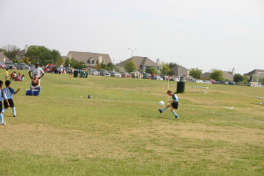 2006-10-TigerSharks-Soccer-26-Chance-high-kick.JPG