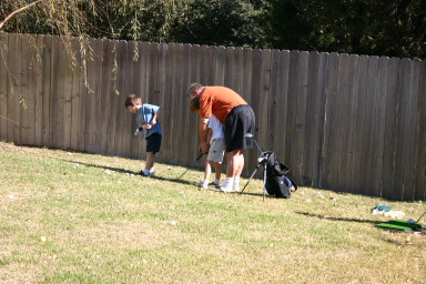 2006-11-23-ThanksGiving-07-Dax-Chance-Jim-golfing.JPG