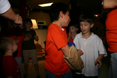 2006-11-14-TigerScouts-Den1-12-glove-gum-game.JPG