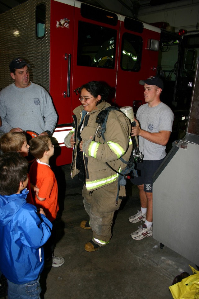 2006-11-21-TigerScouts-firehouse-19-Gina-equipment.JPG