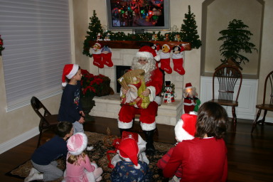 2006-12-24-Christmas-Eve-32-Santa-Dax-Chance-Kyla-Vale-Ian-Heather.JPG