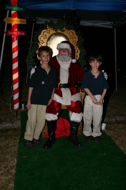 2006-12-12-Trail-of-Lights-Cubscouts-05-Chance-Dax-santa.JPG