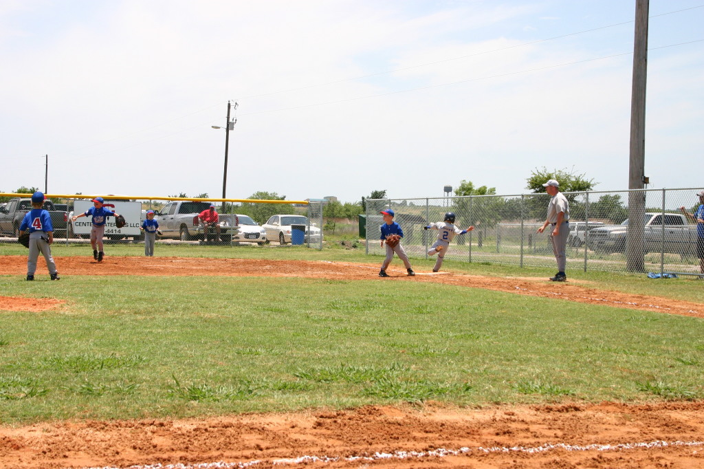 2006-06-17-Tball-AllStars-Bulldogs-Hays-CO-088-Joseph-runs-through-first-GOOD.JPG