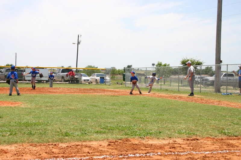 2006-06-17-Tball-AllStars-Bulldogs-Hays-CO-088-Joseph-runs-through-first-GOOD.JPG