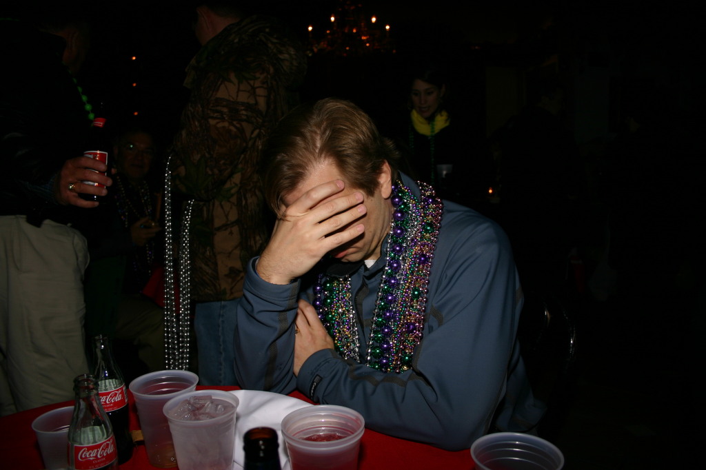 2007/02(February)/02_15_4_Mardi_Gras_Balcony/1024x768_2007-02-15-New-Orleans-Balcony-19-Ben-cigar-headache.JPG