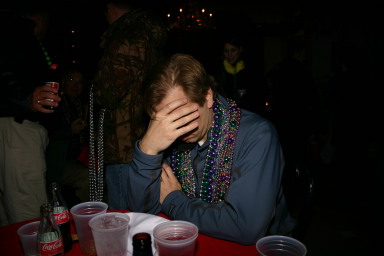 2007-02-15-New-Orleans-Balcony-19-Ben-cigar-headache.JPG