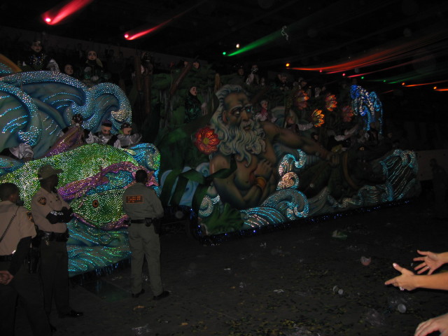 2007-02-17-Extravaganza-91-guys-float-Travis-video-camera.jpg