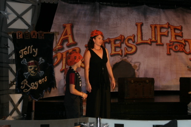 2007-09-26-Disney-Magic-Cruise-18-gameshow-Pirates-life-for-me-Suzi.JPG