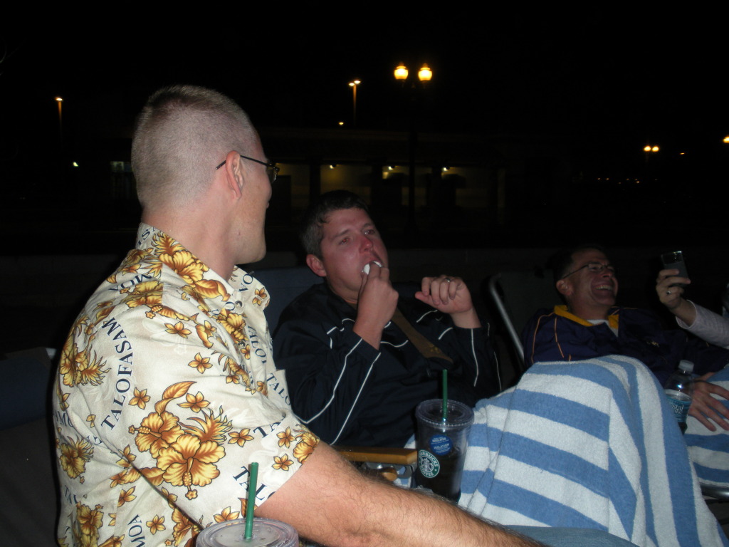 2009-09-15-ITOC-R1-Huntington-Beach-training-41-smores-Travis-Bill-eats-9-marshmellows-Rob.JPG