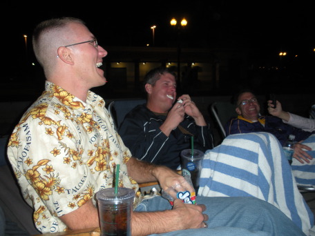2009-09-15-ITOC-R1-Huntington-Beach-training-41-smores-Travis-Bill-eats-8-marshmellows-Rob.JPG