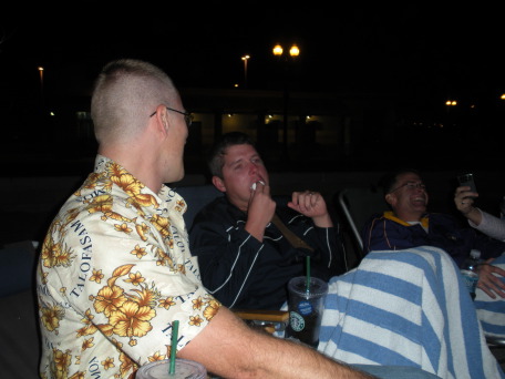 2009-09-15-ITOC-R1-Huntington-Beach-training-41-smores-Travis-Bill-eats-9-marshmellows-Rob.JPG