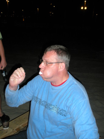 2009-09-16-ITOC-R1-Huntington-Beach-training-35-campfire-Joe-eats-11-marshmellows.JPG