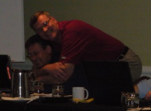 2009-09-17-ITOC-R1-Huntington-Beach-training-02-Steve-Joe-hug-GOOD.jpg