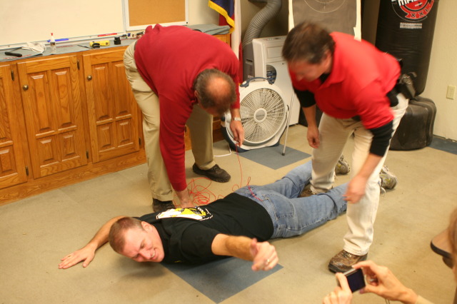 2010-01-12-ITOC-R1-TeamLead-006-Travis-gets-tazed.JPG