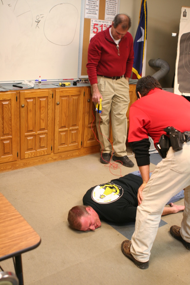 2010-01-12-ITOC-R1-TeamLead-019-Travis-gets-tazed.JPG