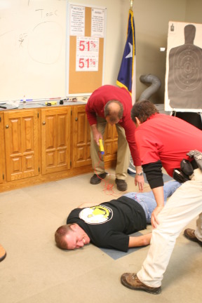 2010-01-12-ITOC-R1-TeamLead-009-Travis-gets-tazed.JPG