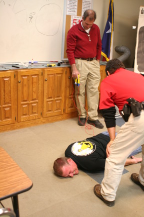 2010-01-12-ITOC-R1-TeamLead-018-Travis-gets-tazed.JPG