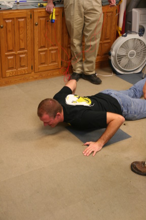 2010-01-12-ITOC-R1-TeamLead-025-Travis-gets-tazed.JPG